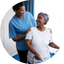 a female caregiver with an elderly woman