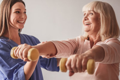 woman assissted old woman