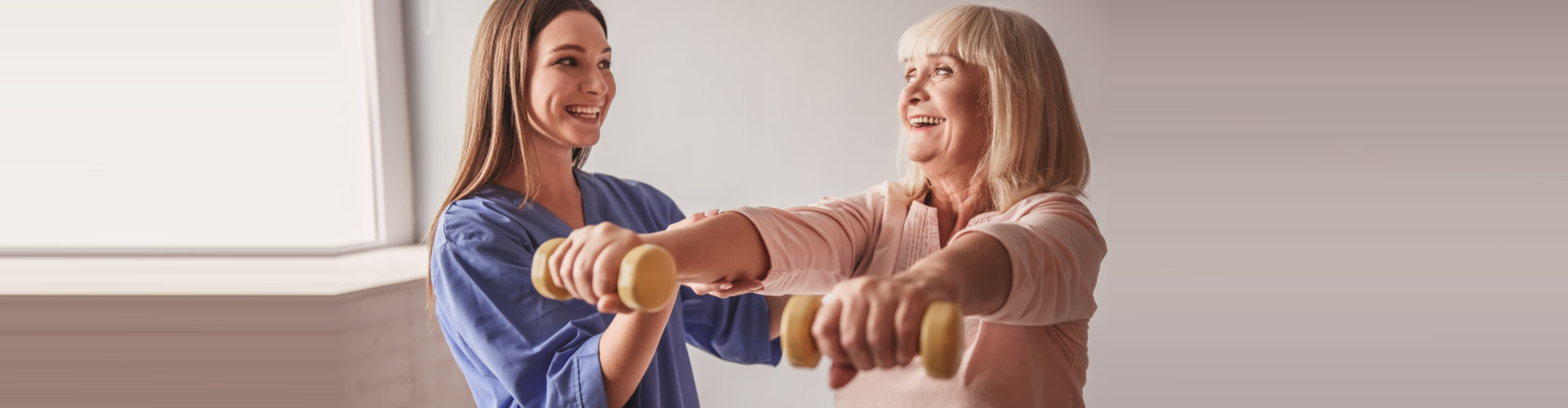 woman assissted old woman